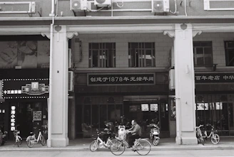 A vintage photo of a business trip delegation in China in the 1990s, showcasing early international trade efforts.