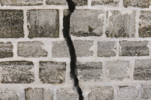 white and gray brick wall repair
