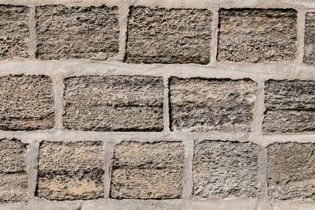 brown and gray brick wall