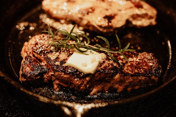 cooked food on black pan