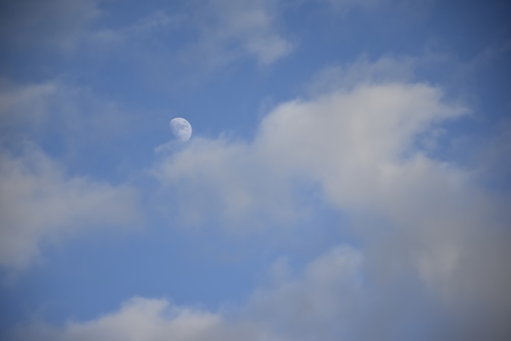 full moon in blue sky