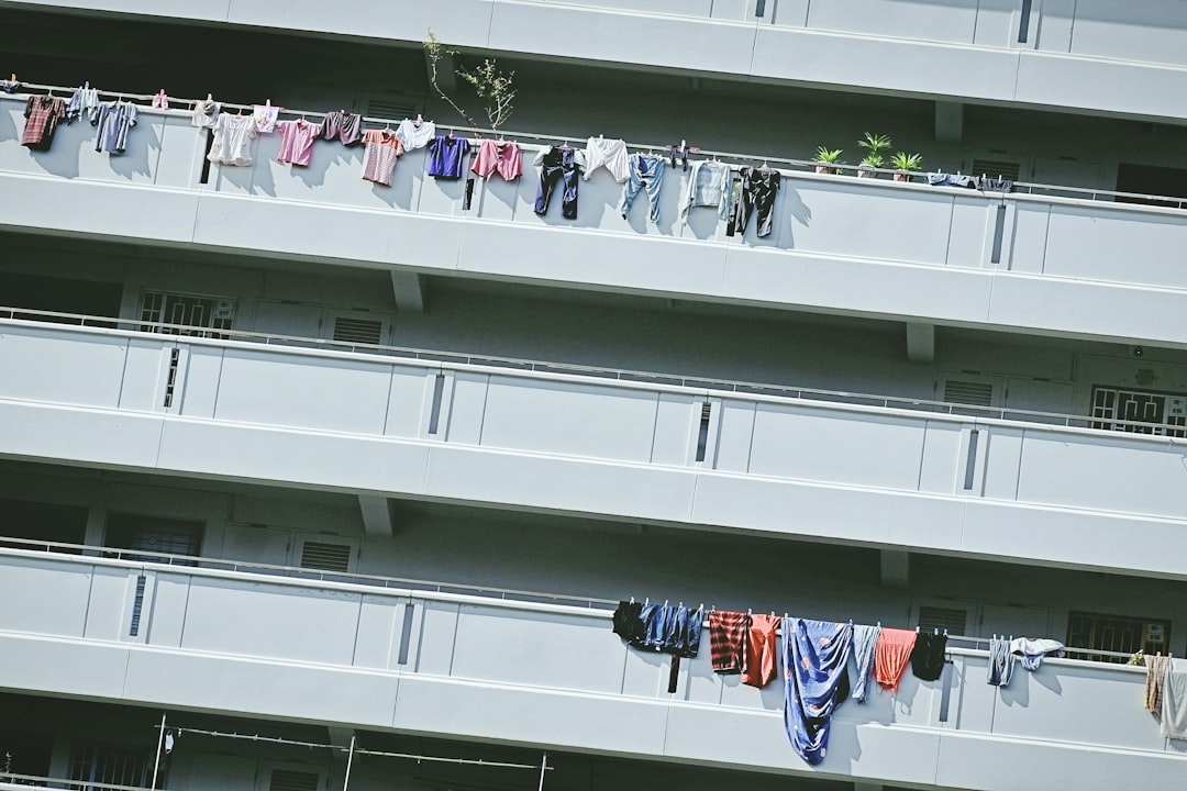 people in white building during daytime