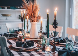 white candles on round table