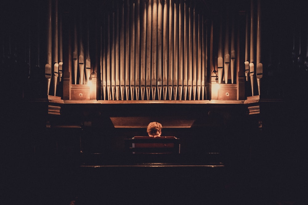 silhouette of person sitting on chair