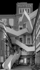 grayscale photo of concrete building