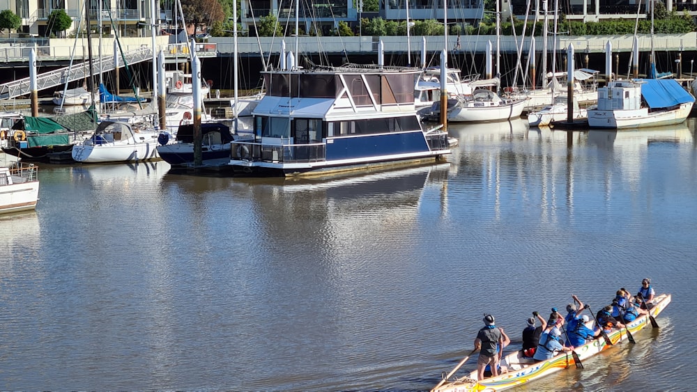 people riding on boat on water during daytime