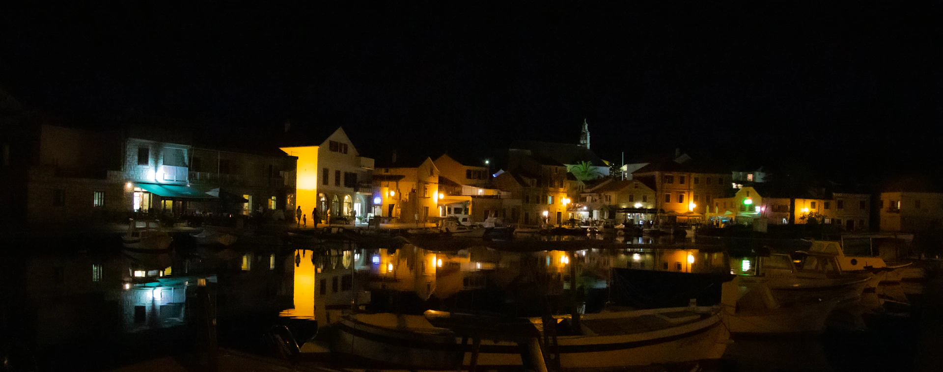 black and brown leather padded tub sofa