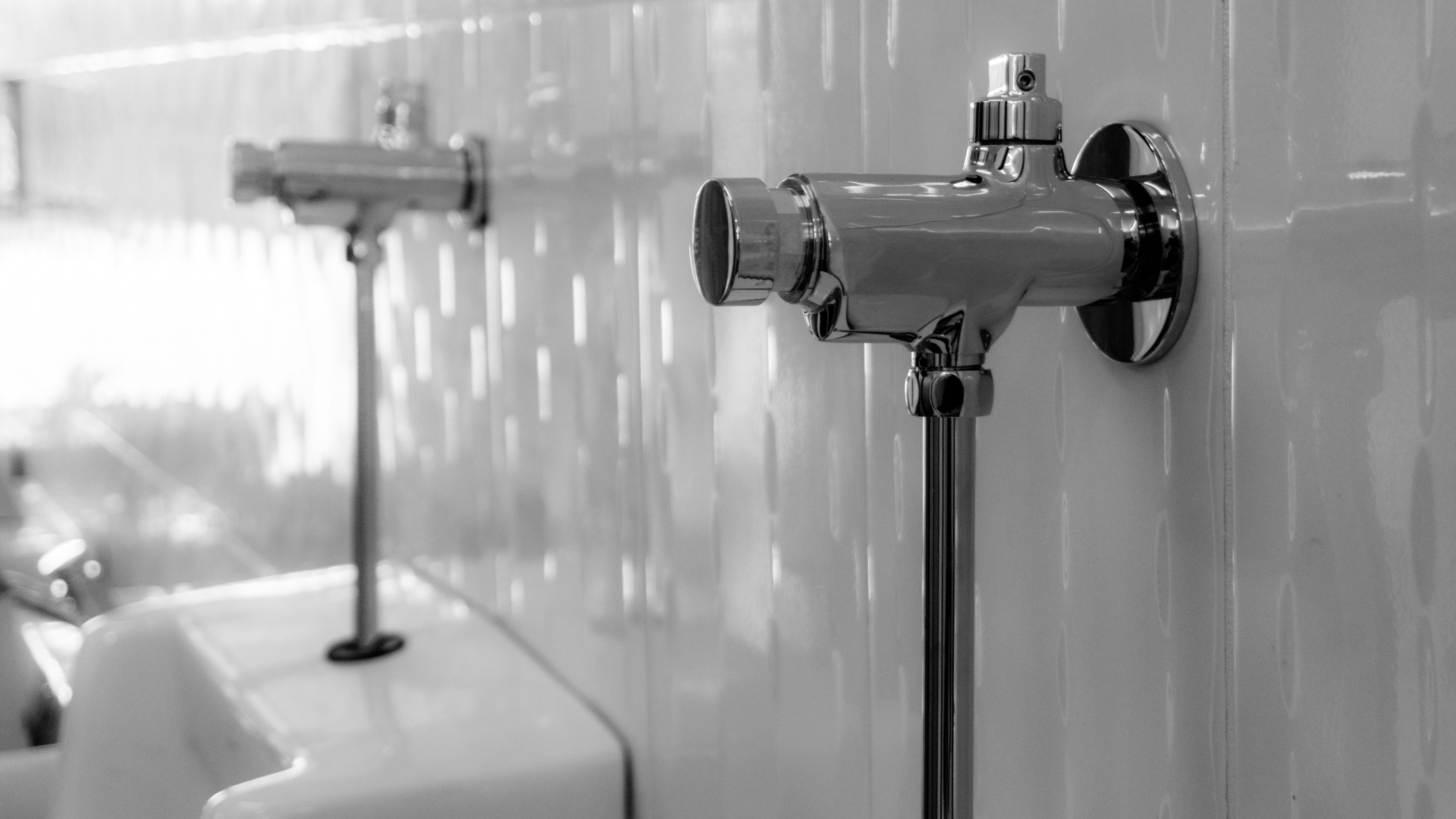 A modern bidet attachment for improved personal hygiene in a bathroom