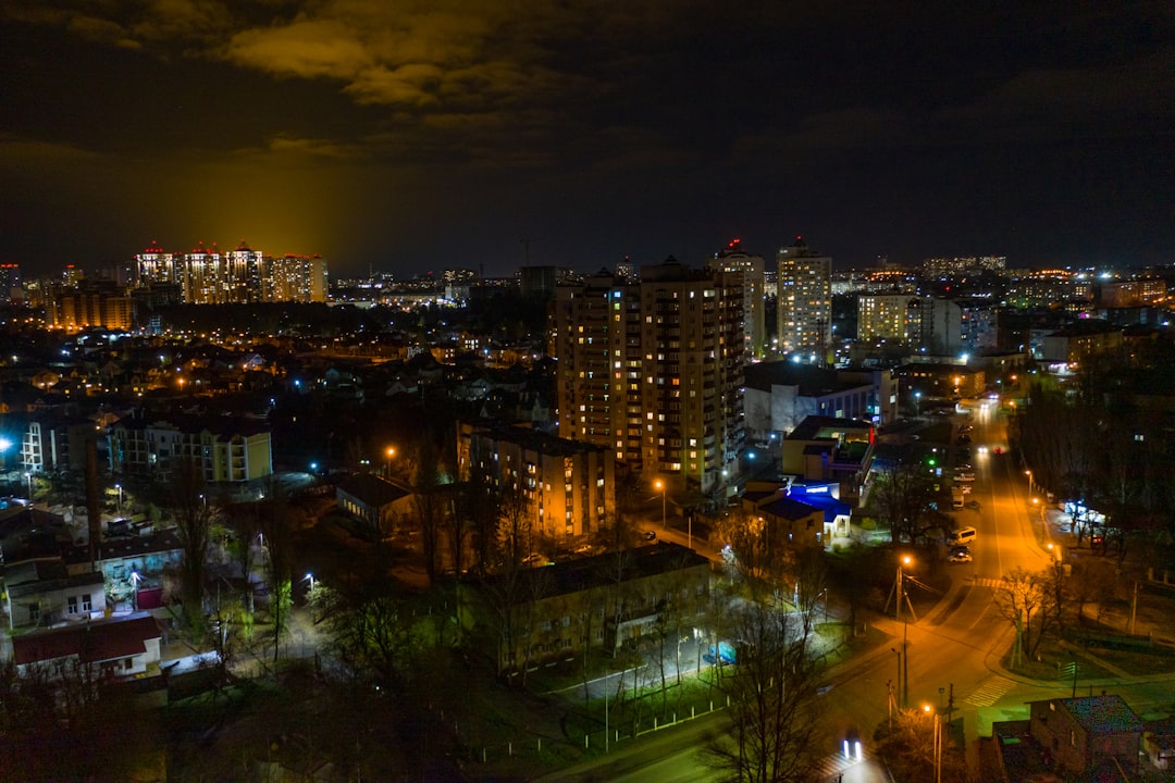 city with high rise buildings during night time