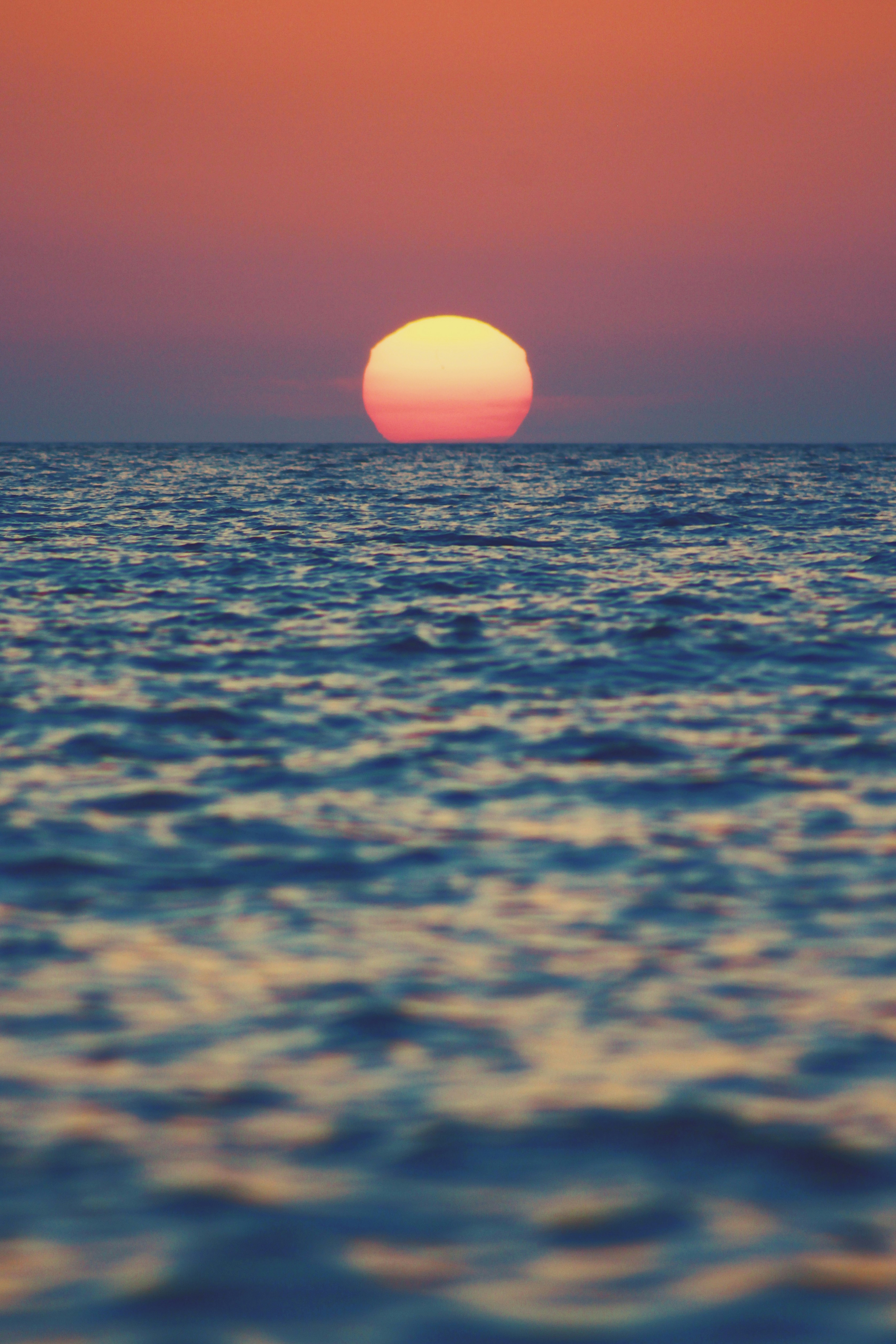 sun over the sea during sunset