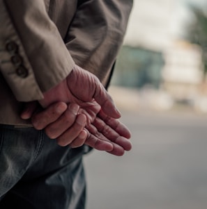 A close-up of adaptive clothing details on a senior man, highlighting comfort and style.