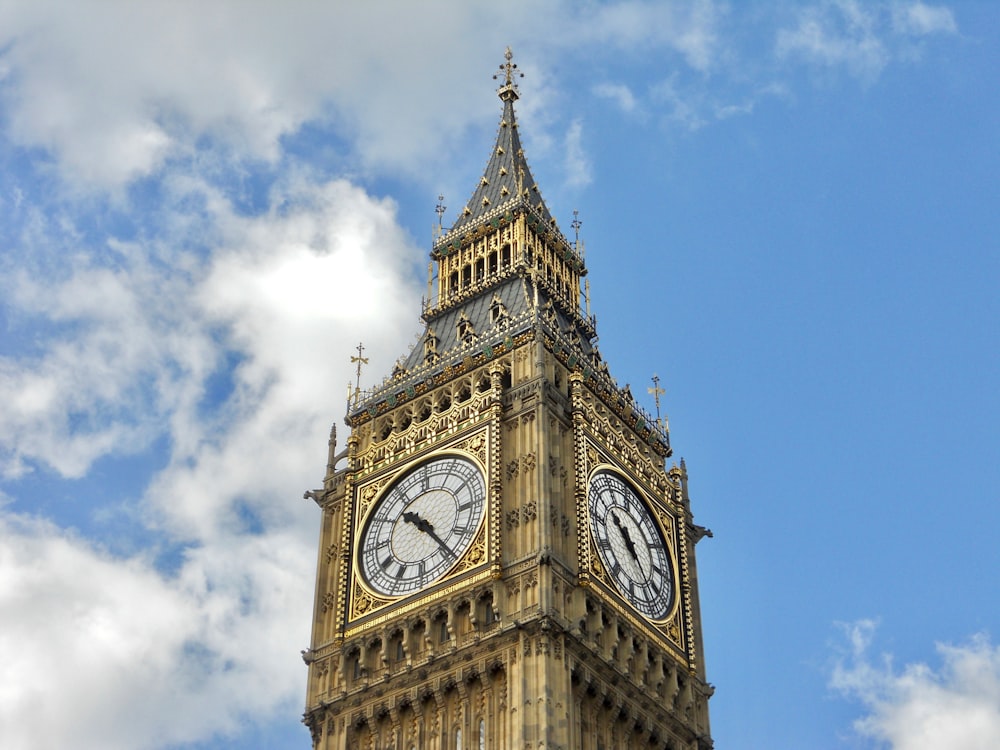 big ben under blue sky and white clouds during daytime