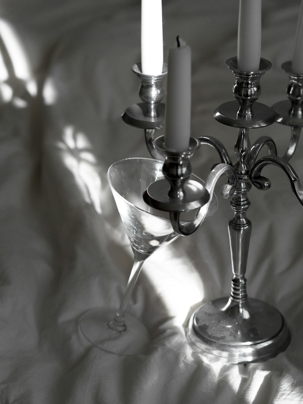 silver and white candle holder