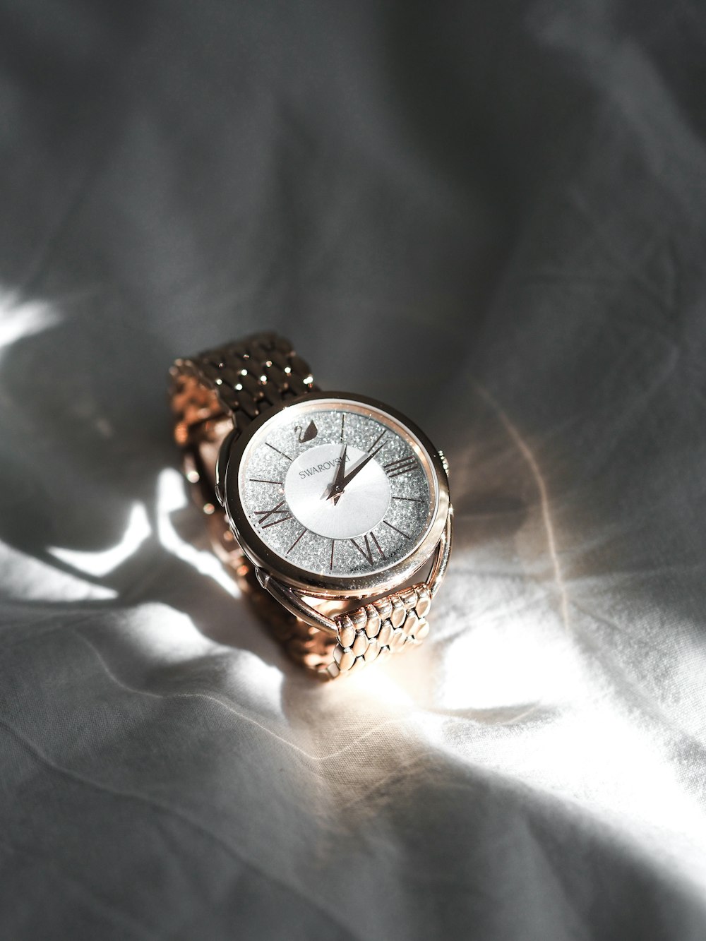 silver and white analog watch