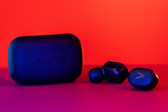 blue and black jbl portable speaker