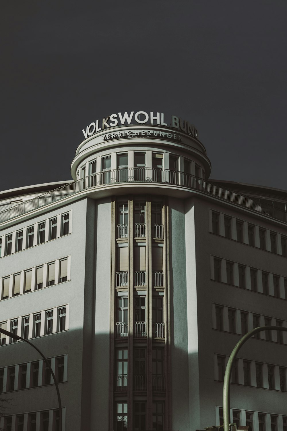 white and gray concrete building during night time