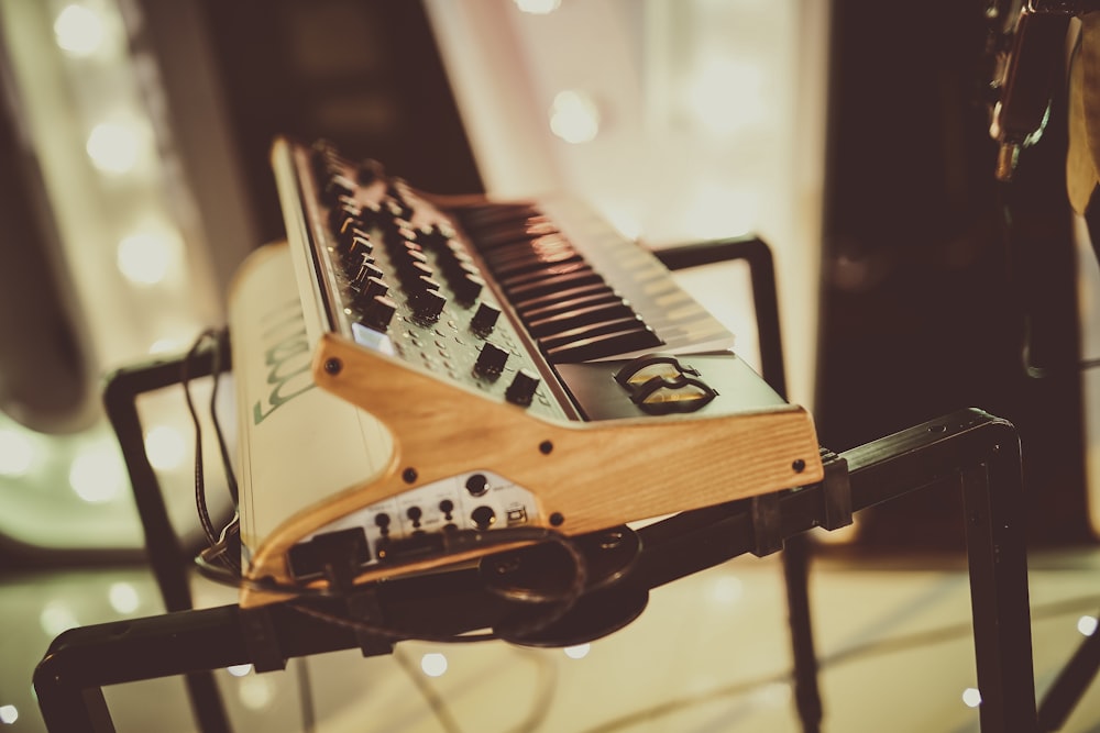 brown and white electric guitar