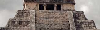 brown brick building under cloudy sky