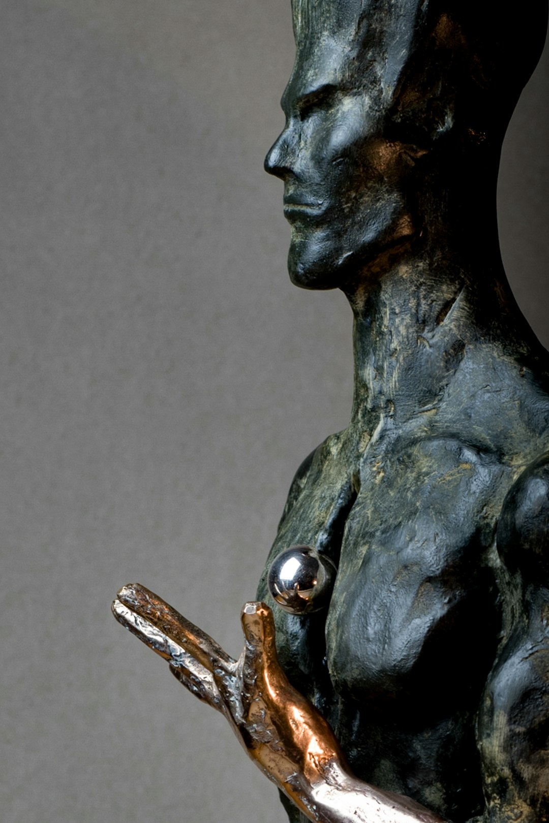 black ceramic statue of a man