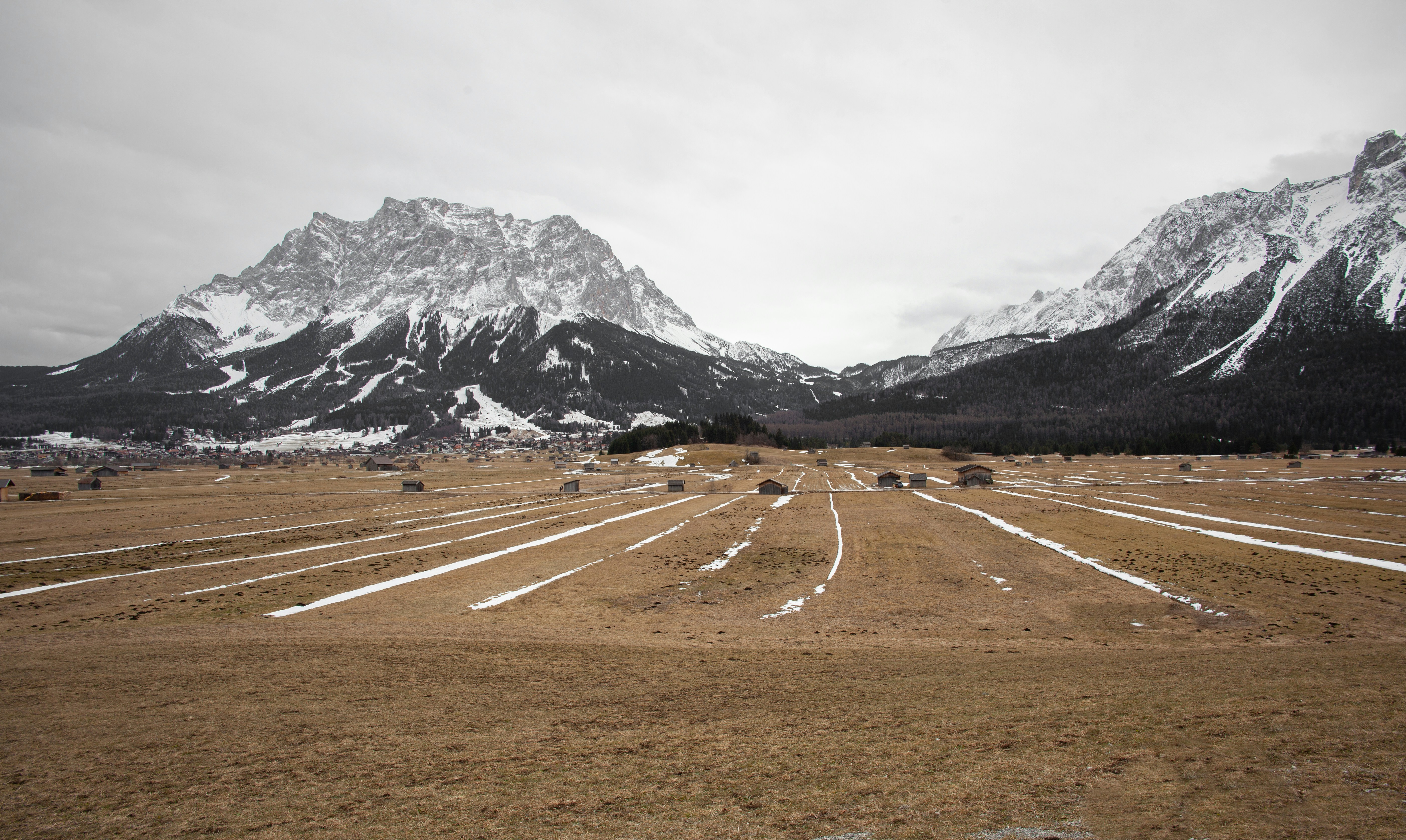 white and black mountains under white sky during daytime