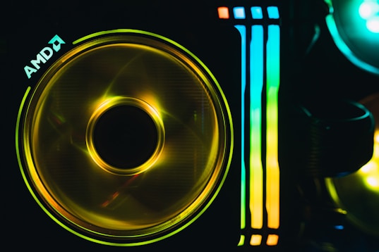 blue and yellow round logo