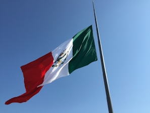 A vibrant green scarf representing Mexico with the official World Cup 2026 logo prominently displayed