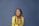 woman in yellow jacket and black and white hijab