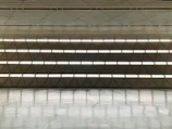 Spacious commercial space with elegant black and silver interior accents.
