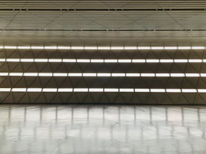 Spacious commercial space with elegant black and silver interior accents.