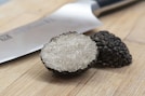 black and gray round ornament on brown wooden table