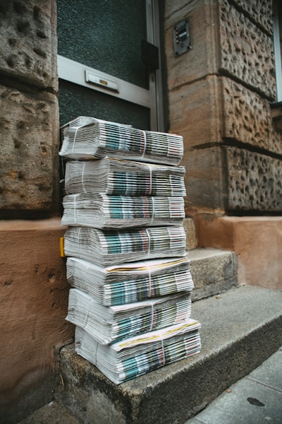 Stack of white and blue magazines