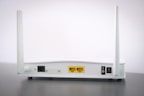 A modern wireless router with multiple antennas emitting signal waves