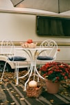 red and white flowers on white table