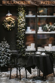 Cozy café table set for a romantic reservation with warm seasonal decor.