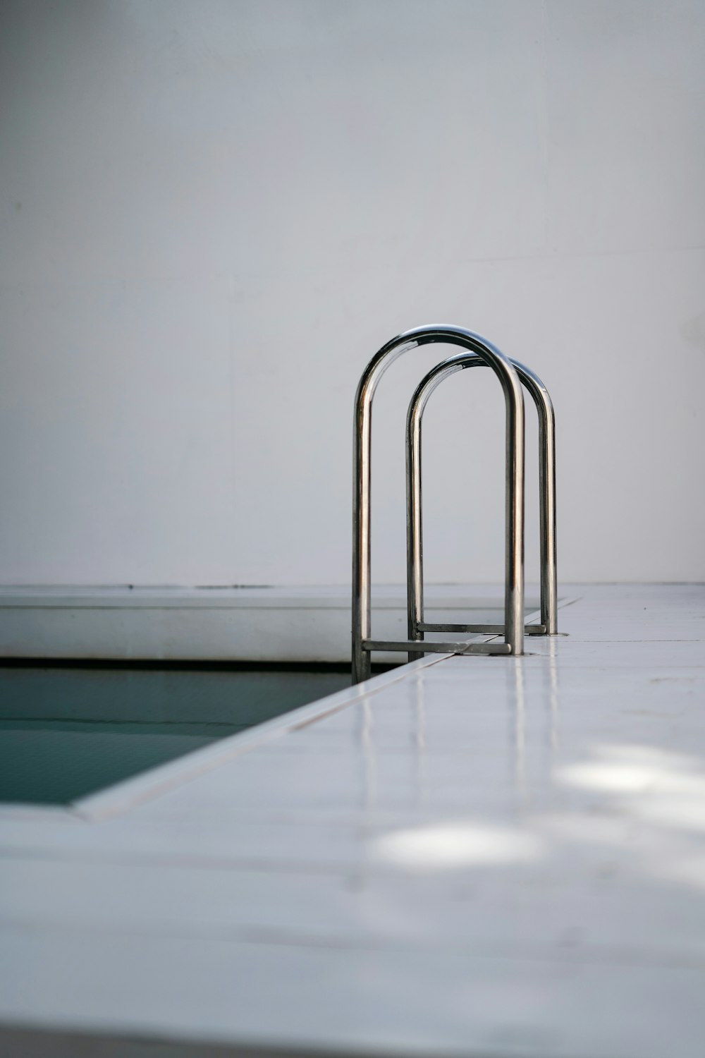 stainless steel rack on white table