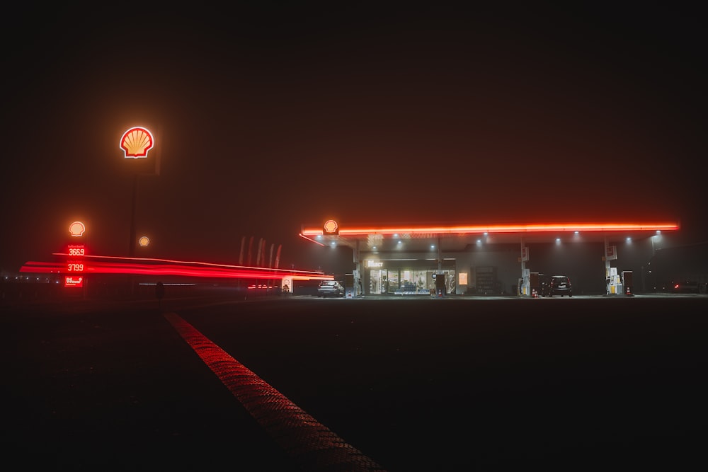 red light on road during night time