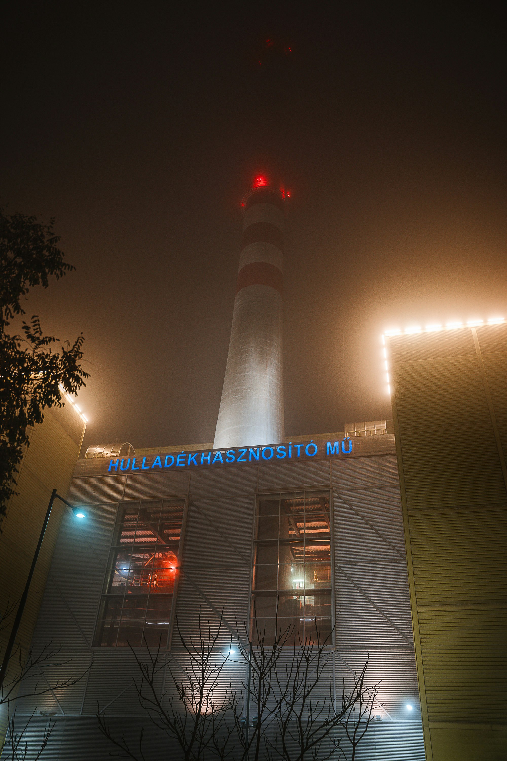 white and red concrete building during night time