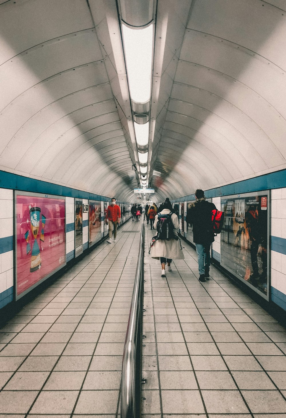 people walking on train station