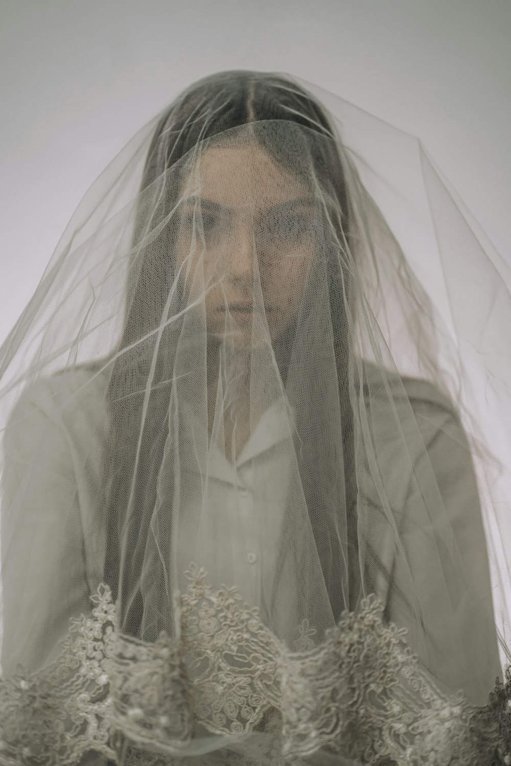 woman in white floral wedding dress