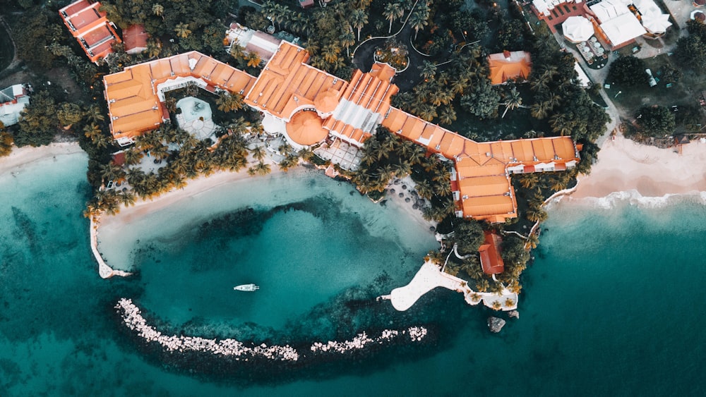 aerial view of brown building on water