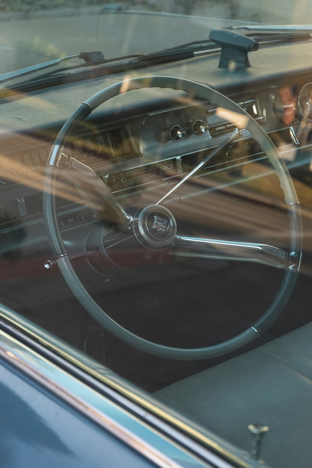 black steering wheel in close up photography