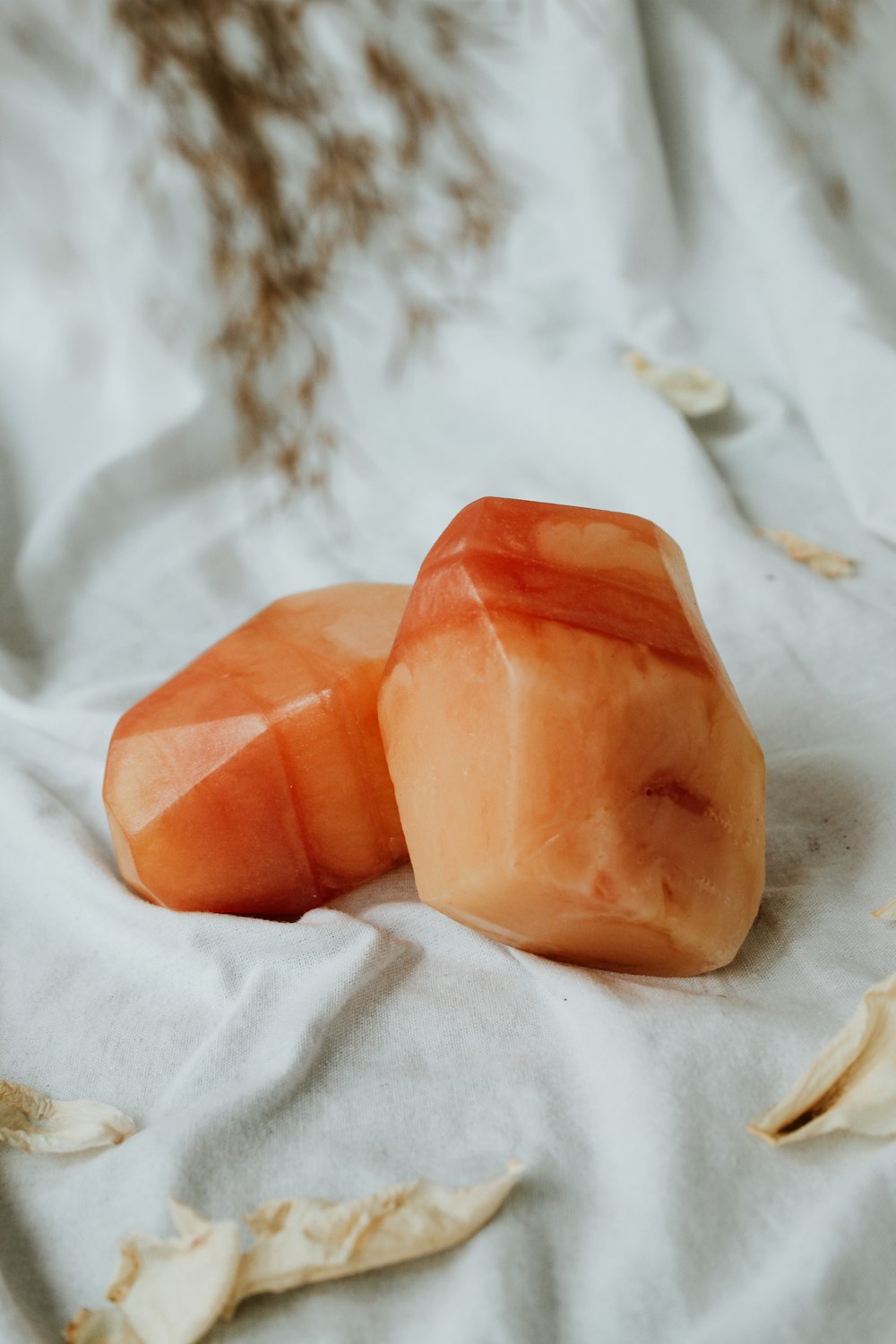 orange clay on white textile