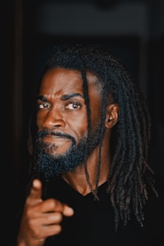 Man in a black tank top practicing the Meisner Acting Technique