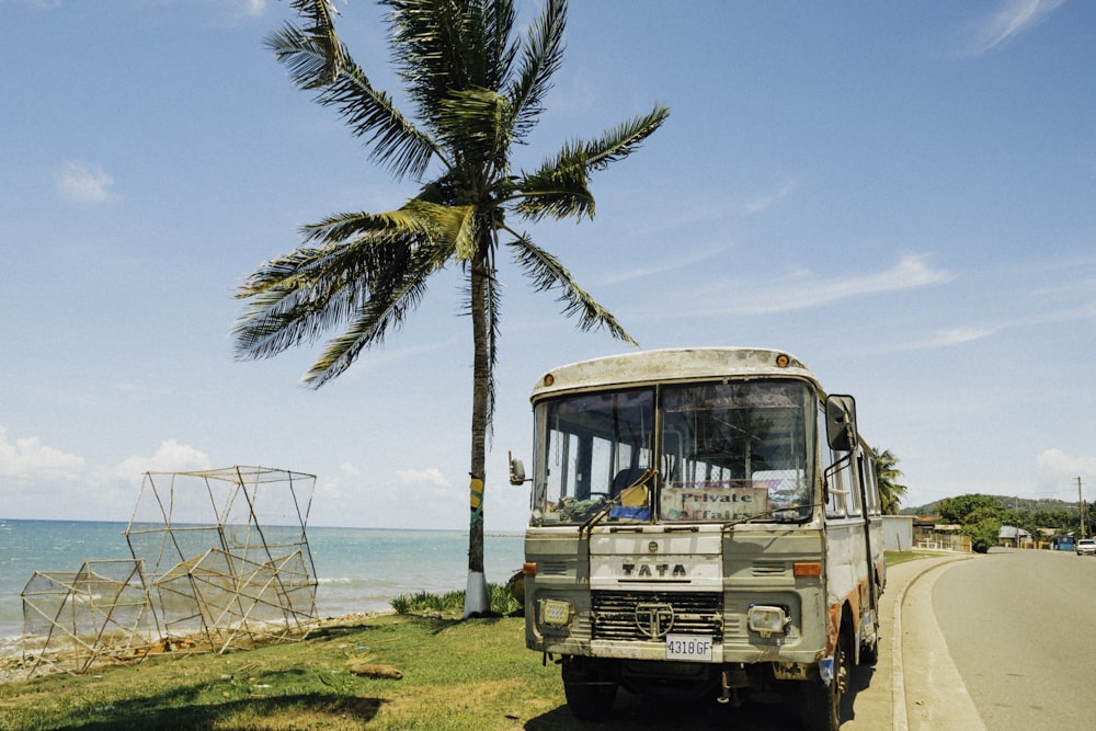 white and brown van on beach during daytime