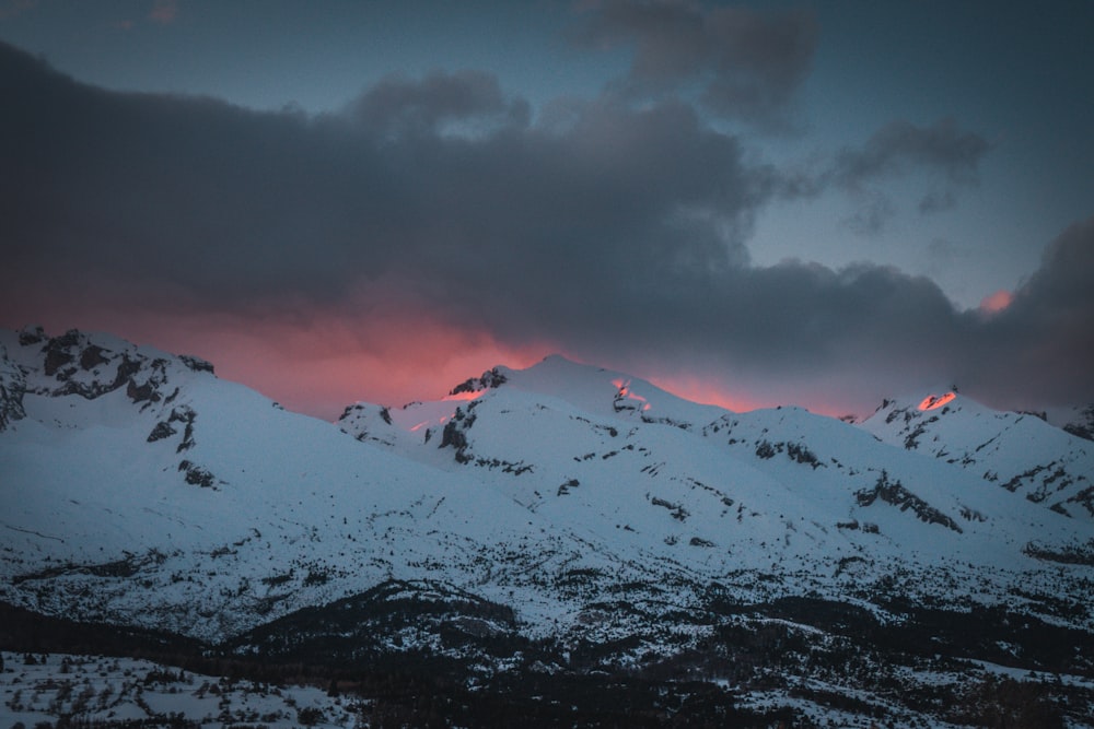 snow covered mountain during daytime