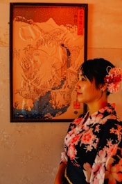 woman in black white and red floral dress