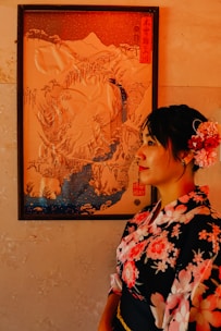 woman in black white and red floral dress