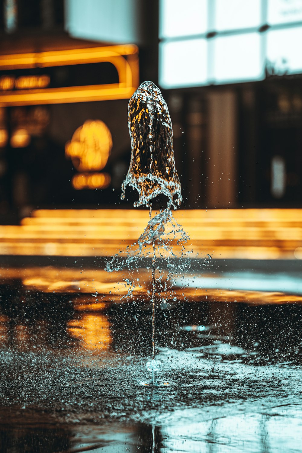 water fountain in the middle of the road