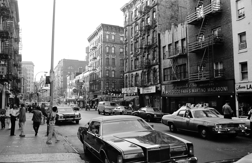 grayscale photo of cars on road