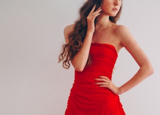 woman in red tube dress